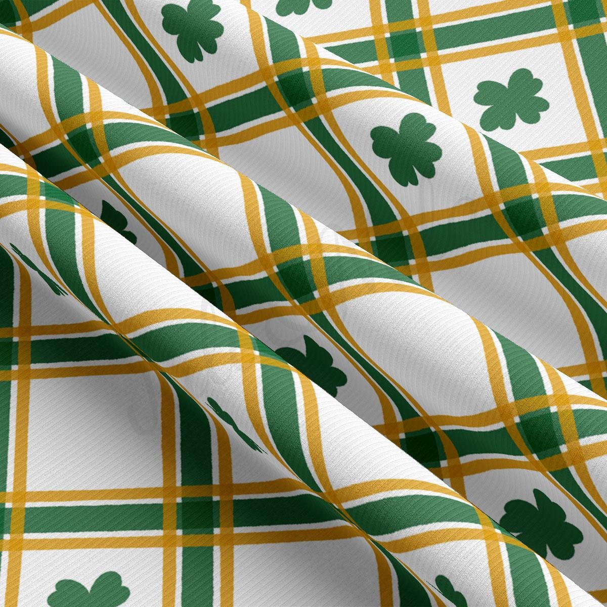 a green and yellow plaid with shamrocks on it