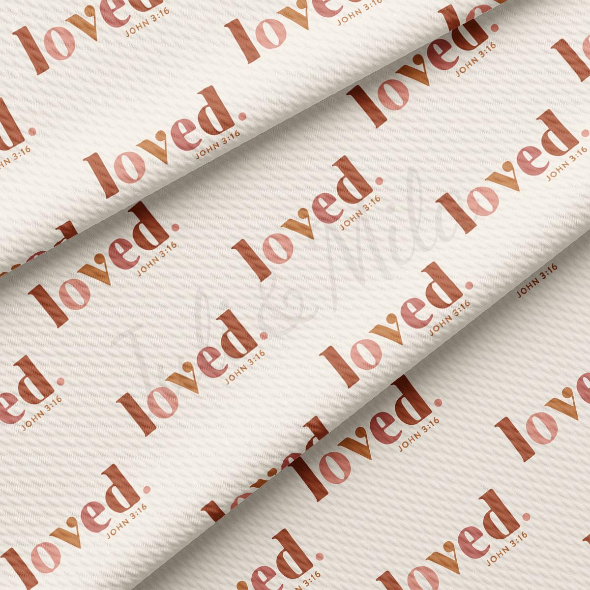 a repeating pattern of the word "loved" in a bold, orange font.