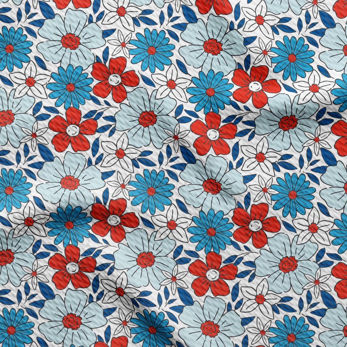 a red, white, and blue flower pattern on a white background