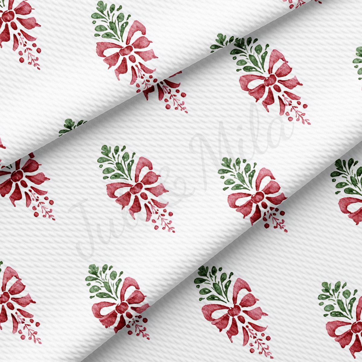 a repeating pattern of red and green floral designs on a white background.