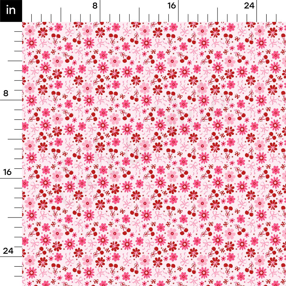 a pink and red flower pattern on a ruler