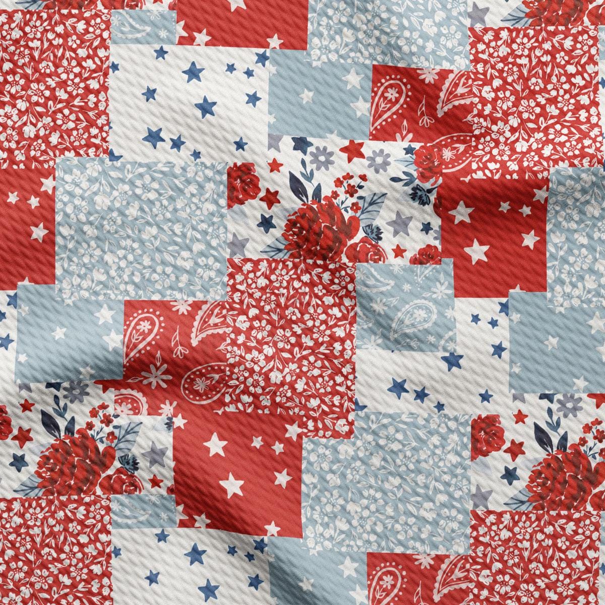 a red, white, and blue quilt with stars