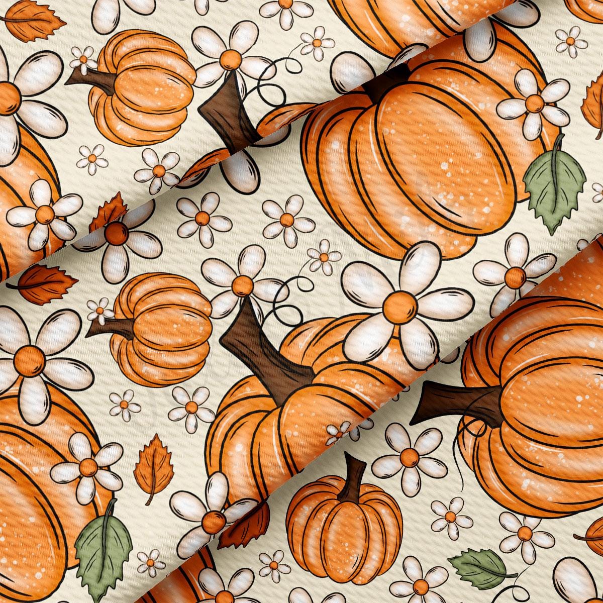 a repeating pattern of orange pumpkins and white flowers on a light-colored background.