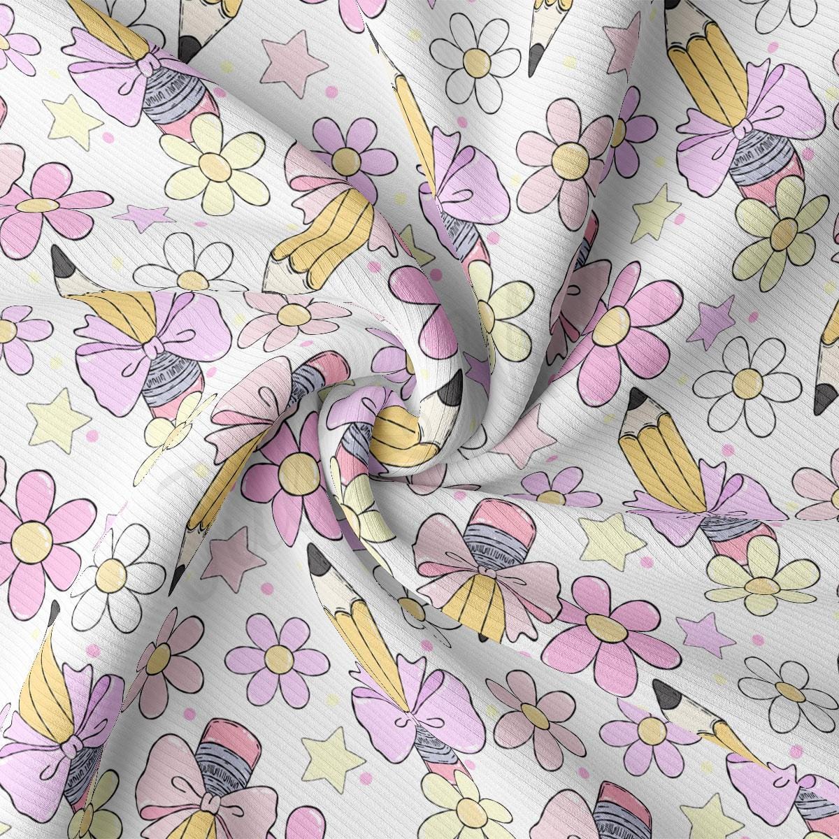 a white fabric with a flower pattern on it