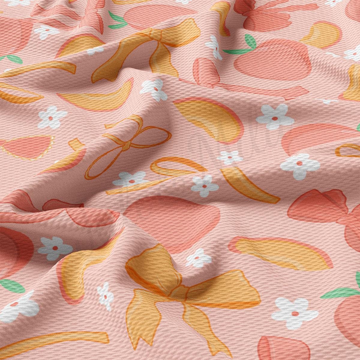 a close up of a pink fabric with flowers on it