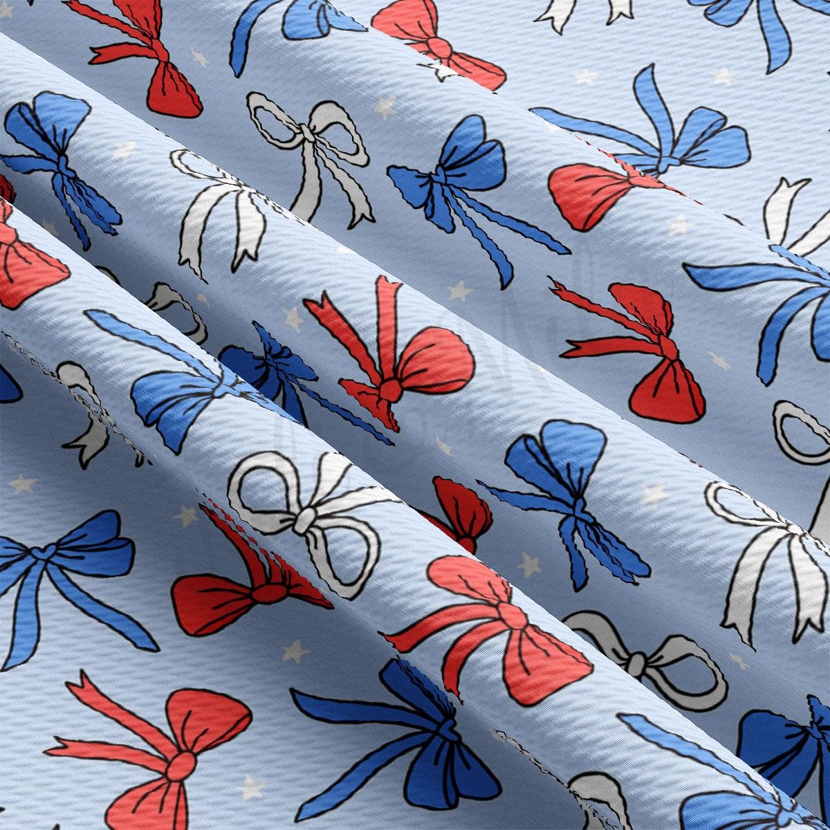 a blue background with red, white and blue bows