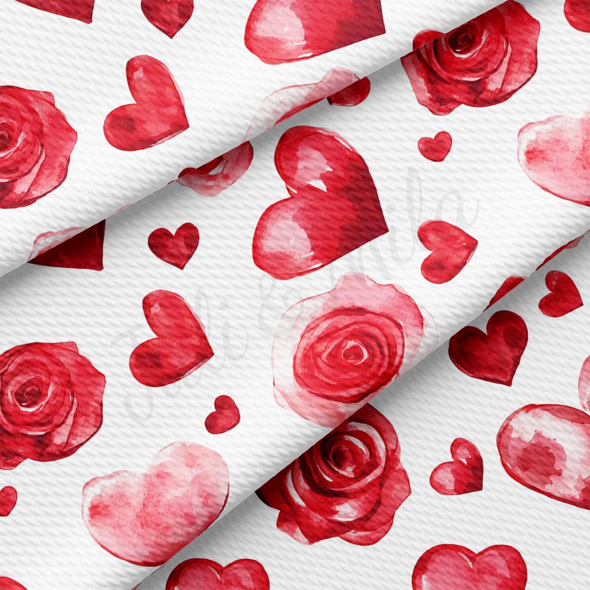 a repeating pattern of red hearts and roses on a white background.