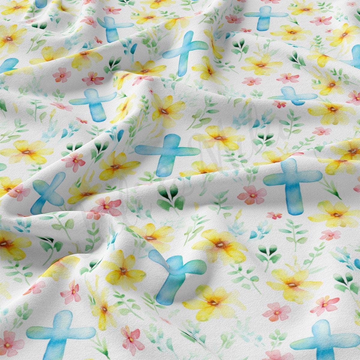 a close up of a flowered fabric with a cross on it
