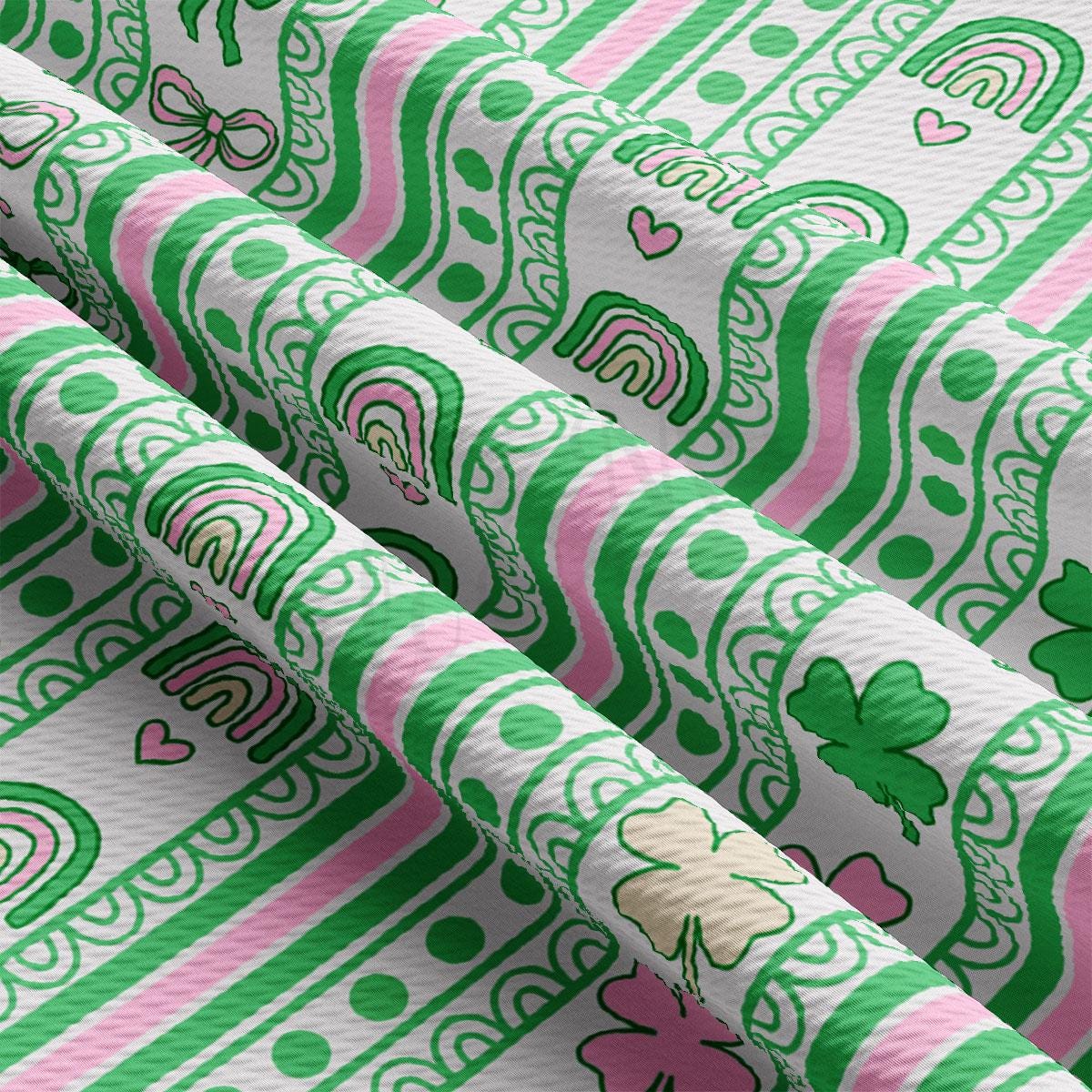 a close up of a green and pink pattern