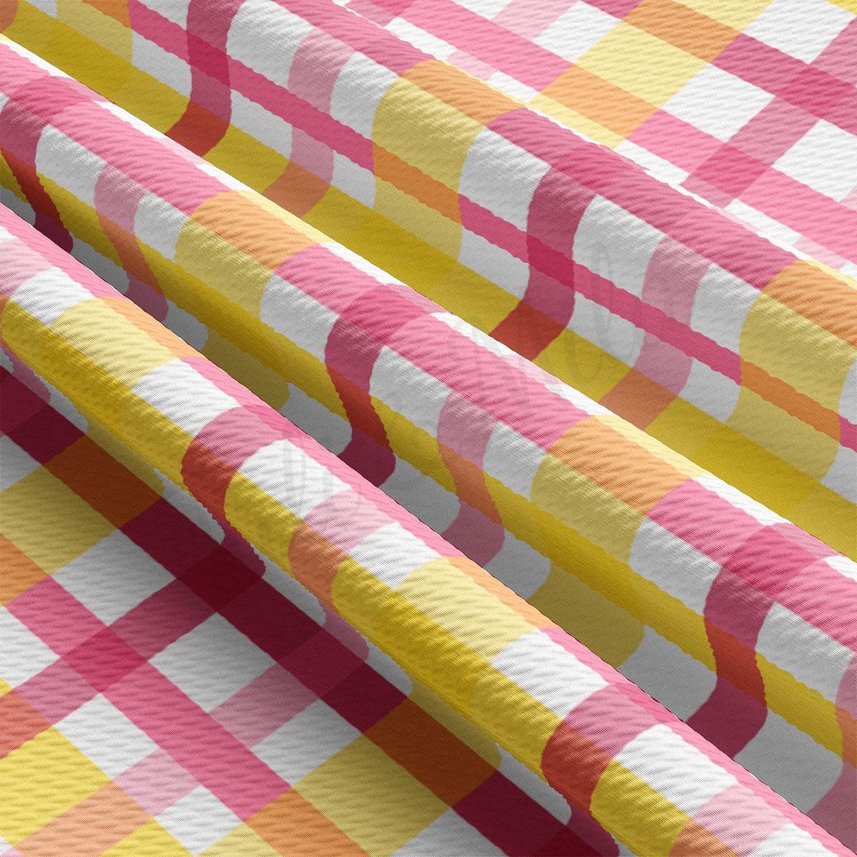 a pink, yellow and white checkered table cloth
