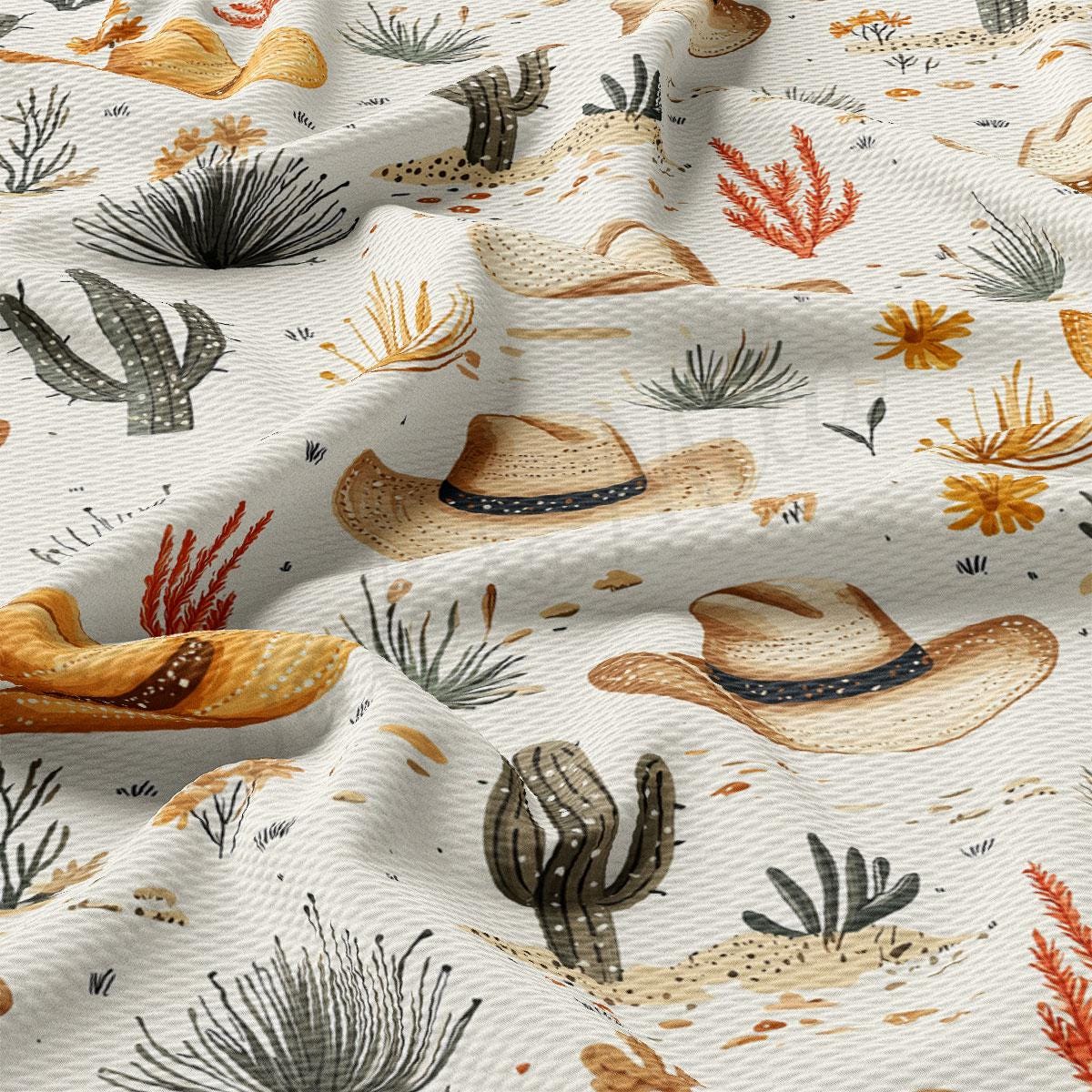 a close-up view of a fabric with a repeating pattern of various desert-themed elements, including cacti, flowers, and hats.