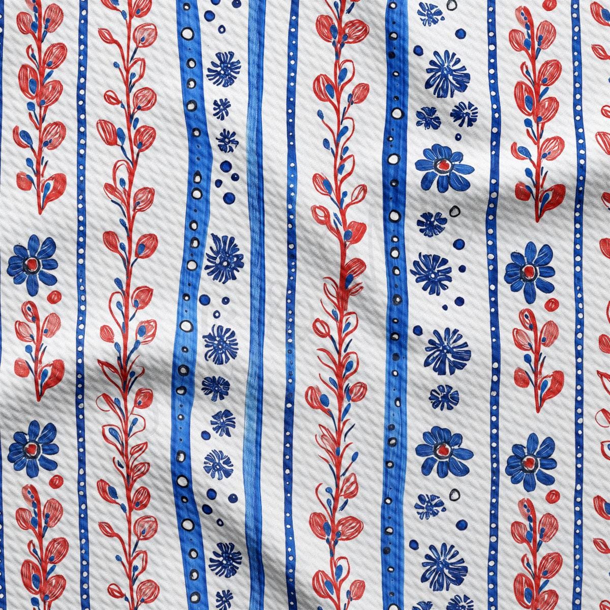 a close up of a blue and red floral print fabric