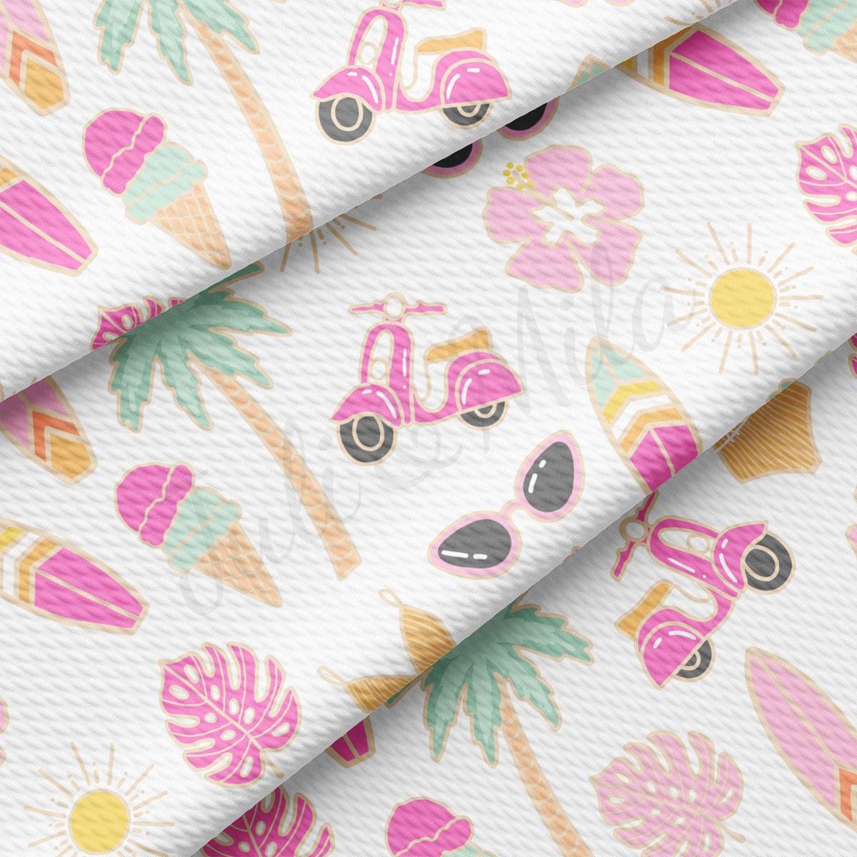 a close up of a white fabric with pink and yellow flowers