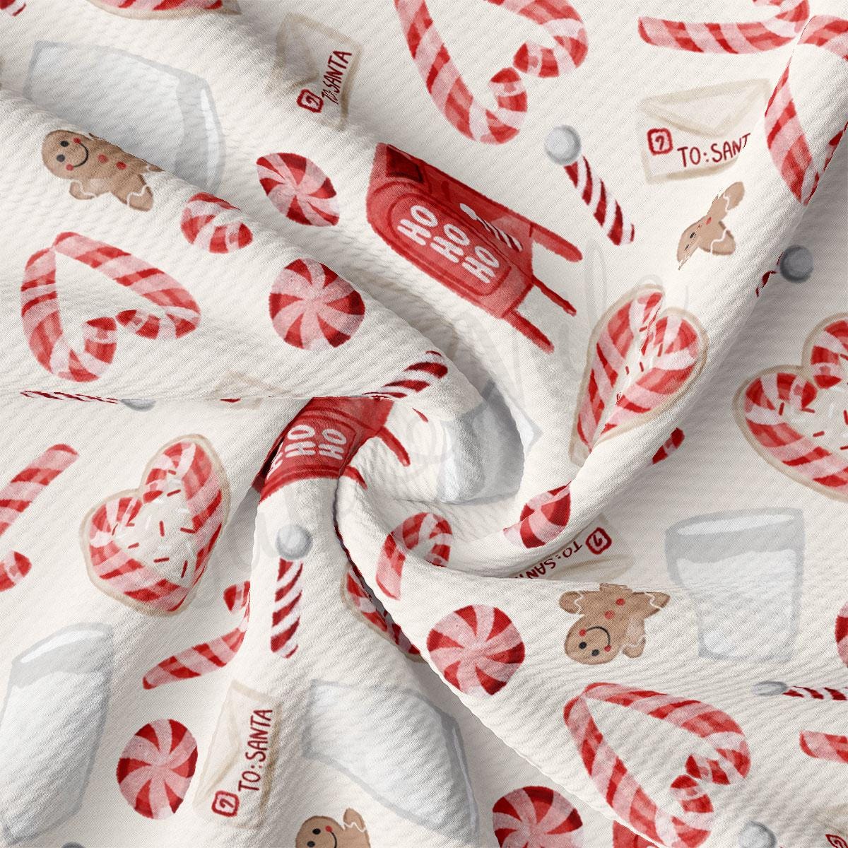 a white fabric with red and white candy canes