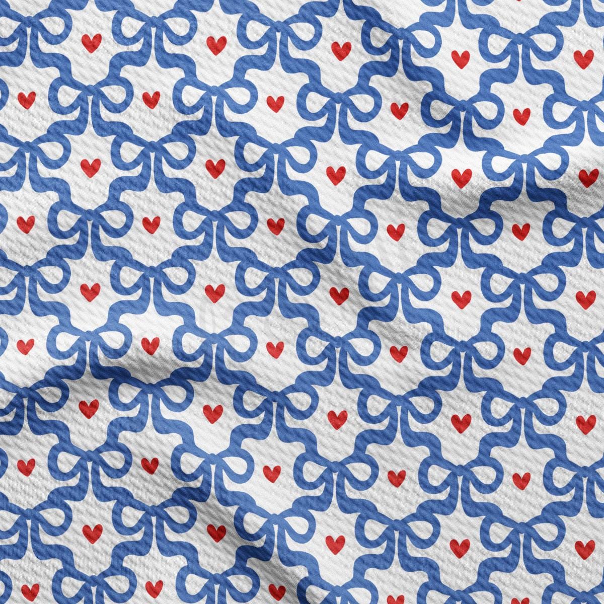 a blue and white pattern with red hearts on it