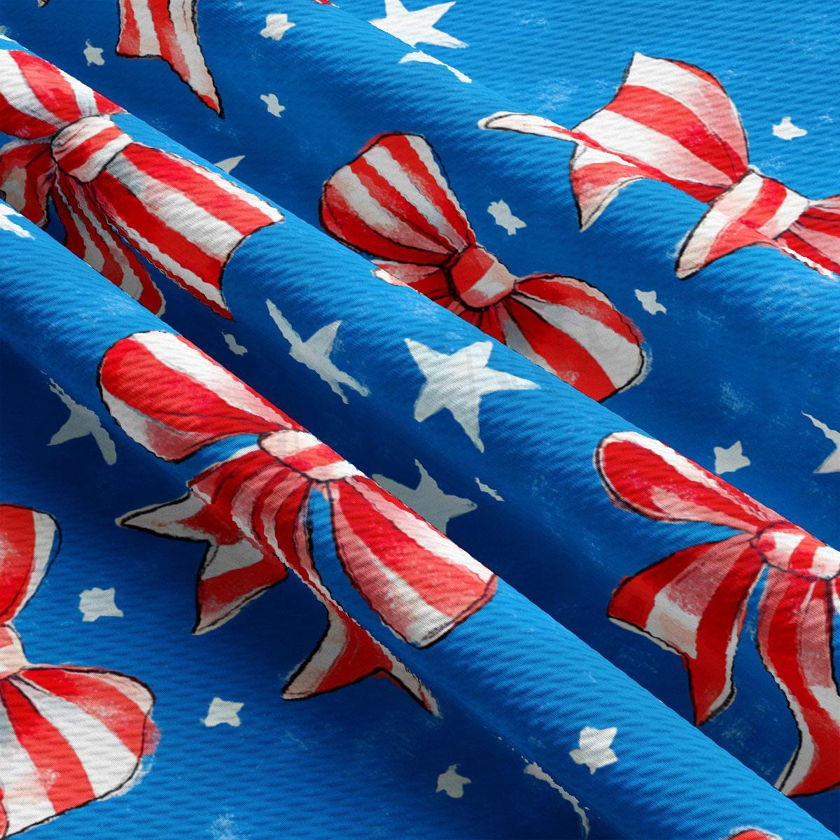 a blue background with red, white and blue bows