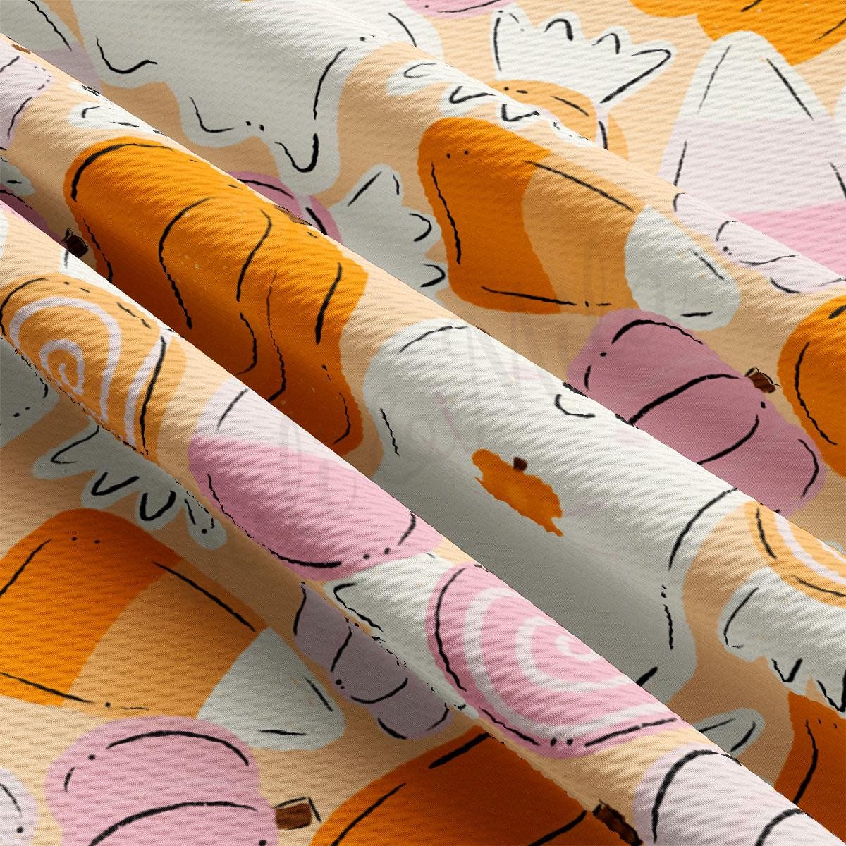 The image is a close-up view of a fabric with a repeating pattern of orange and pink shapes, resembling a candy or dessert design.