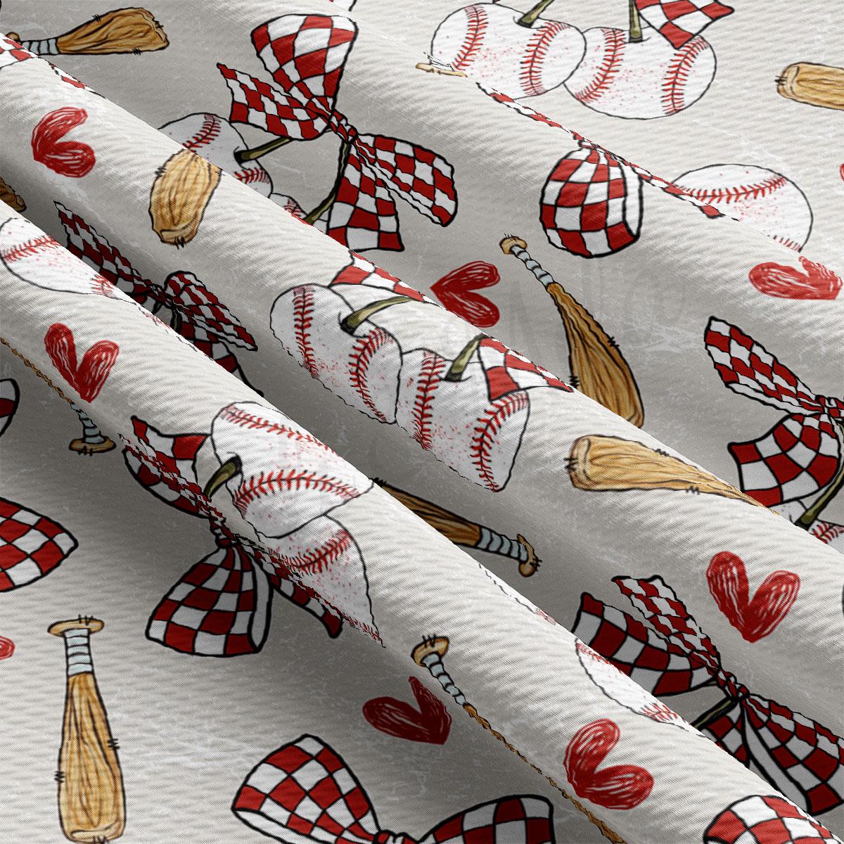 a close-up view of a fabric with a repeating pattern of baseballs, bats, and checkered flags.
