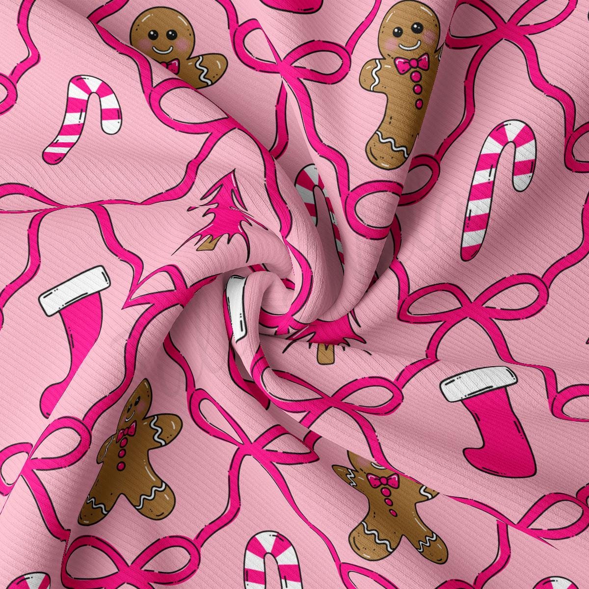 a pink fabric with a repeating pattern of gingerbread men and candy canes.