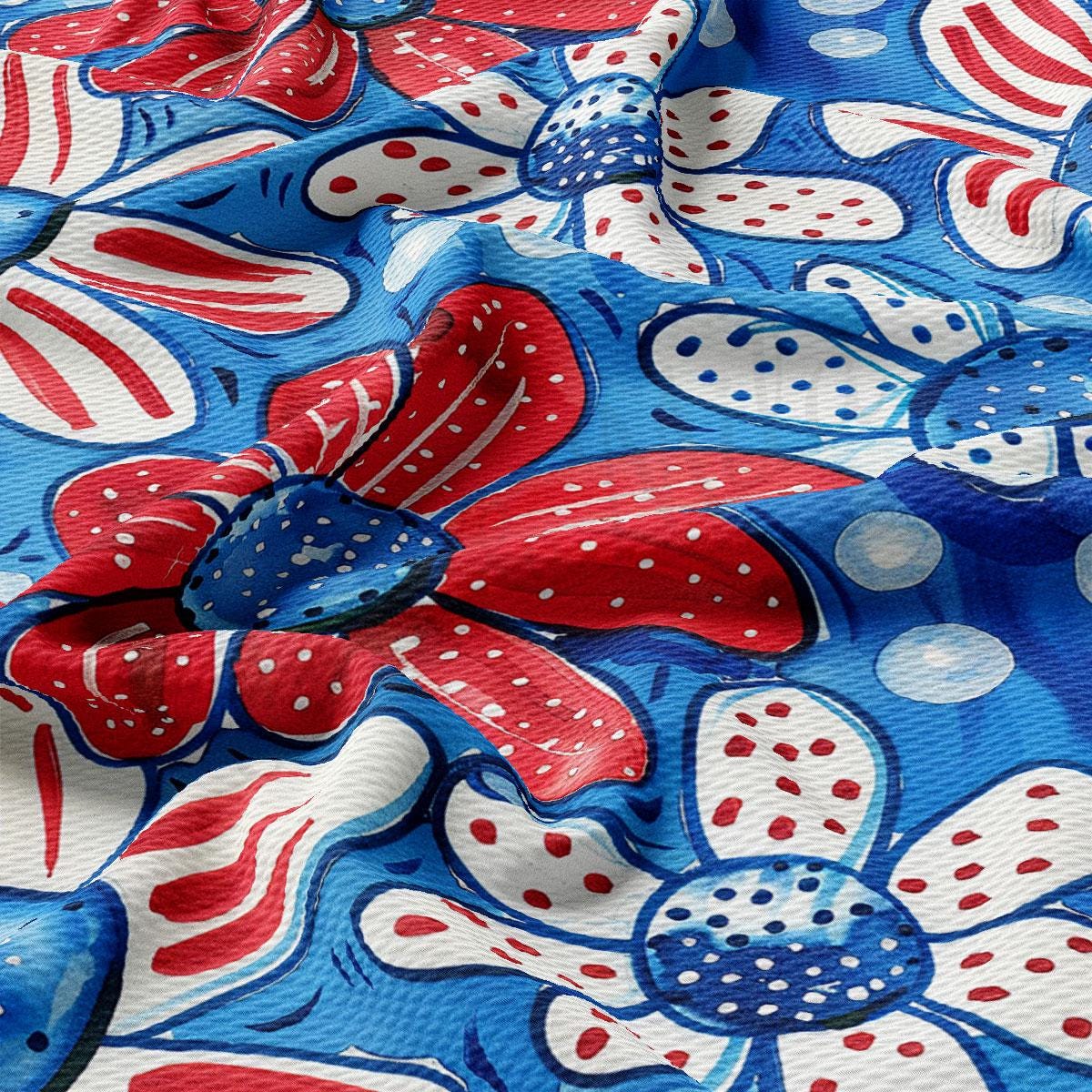 a red, white and blue flower on a blue background