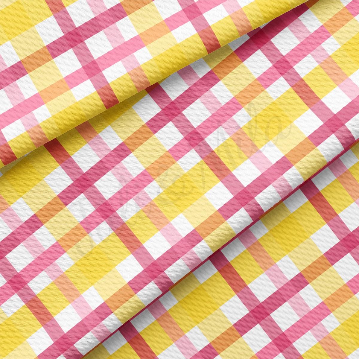 a yellow and pink checkered table cloth