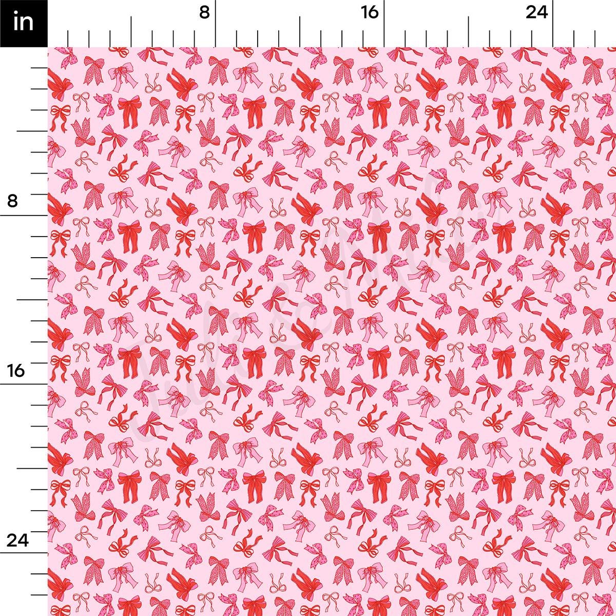 a pink and red pattern with a ruler in front of it