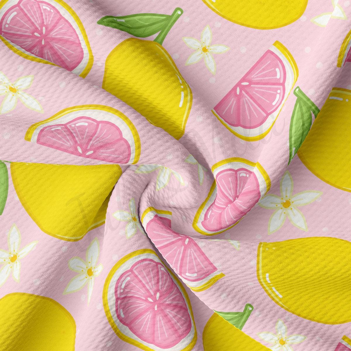 a pink background with lemons and limes on it