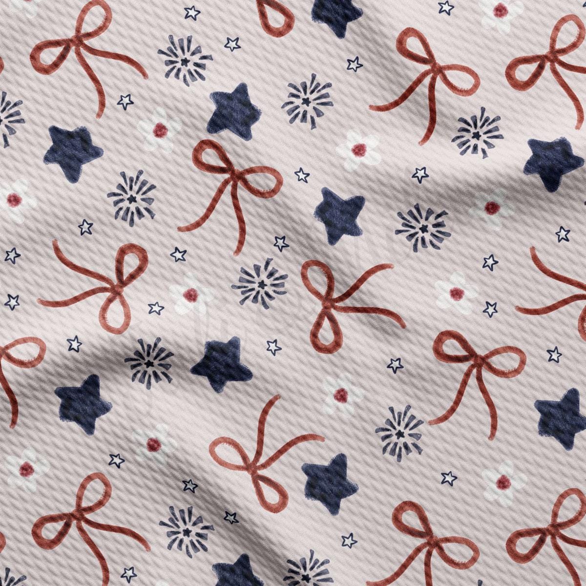 a red, white, and blue pattern of bows and stars