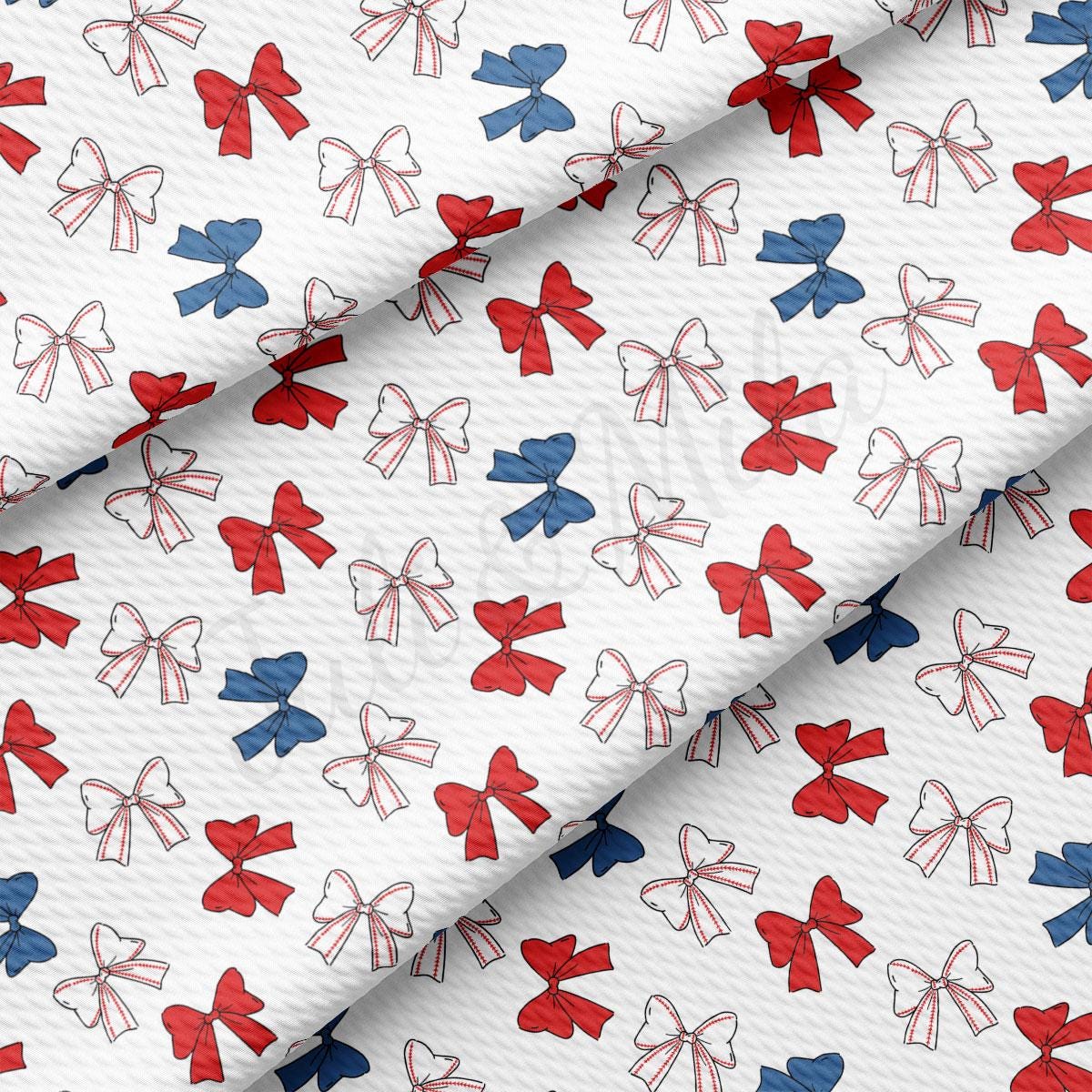 a white background with red, white and blue bows