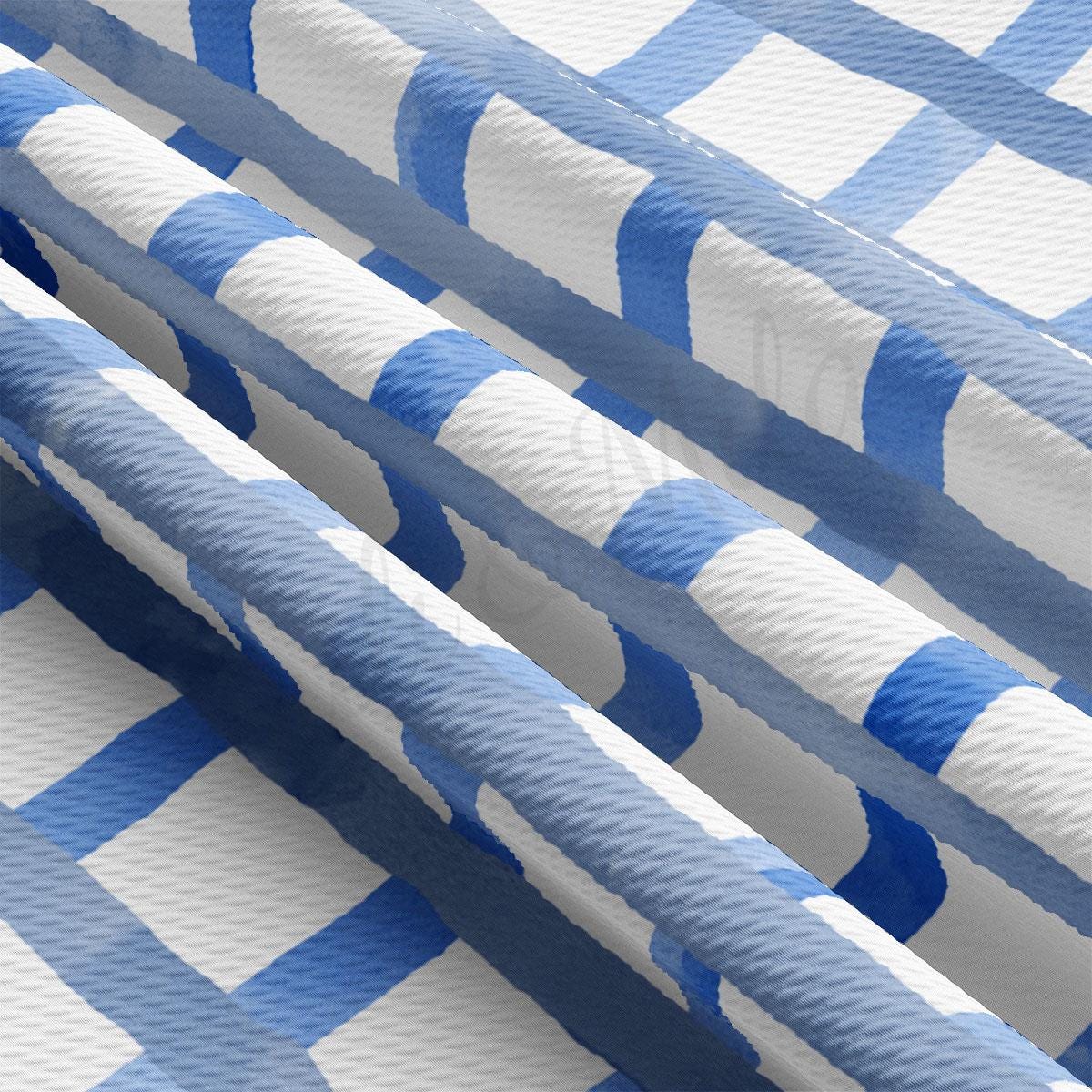 a close up of a blue and white checkered curtain