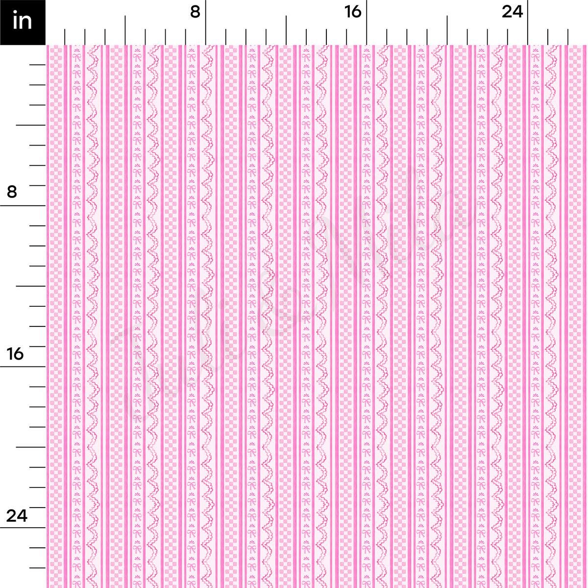 a ruler with a pink and white pattern on it