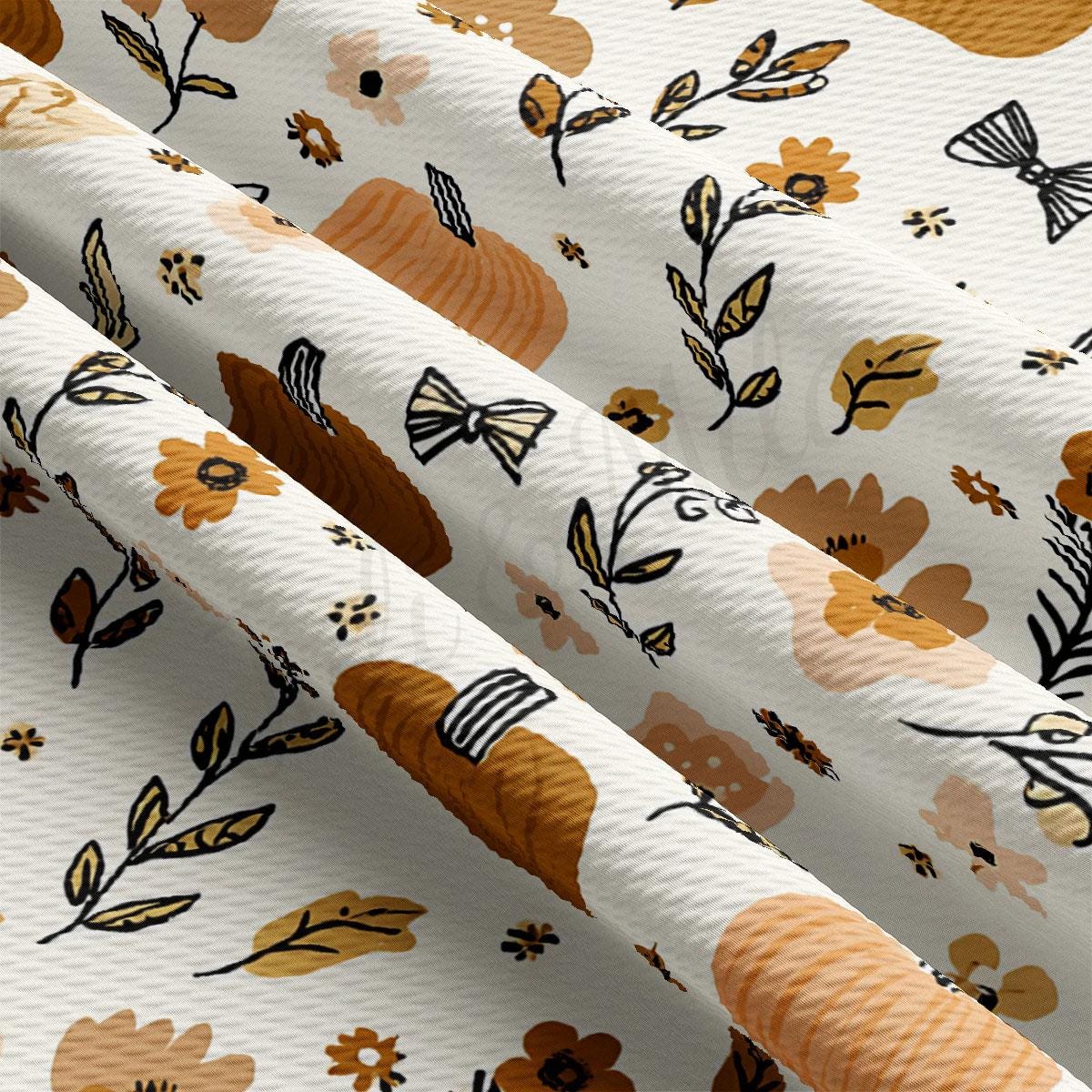 a close-up view of a fabric with a repeating pattern of autumn leaves, flowers, and pumpkins in shades of brown and orange.