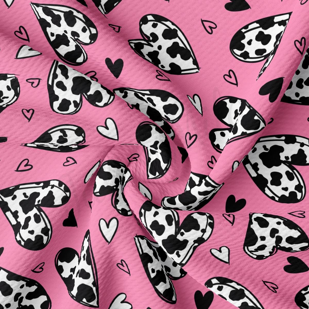 a pink background with black and white hearts and hearts