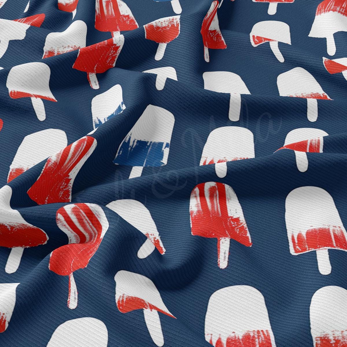 a blue and white fabric with red and white ice cream cones on it