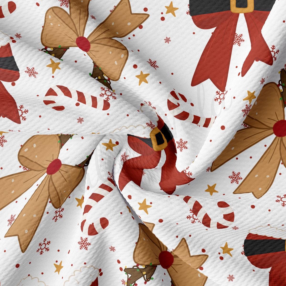 The image is a close-up of a fabric with a Christmas-themed pattern, featuring various shapes and designs such as bows, candy canes, snowflakes, and stars.