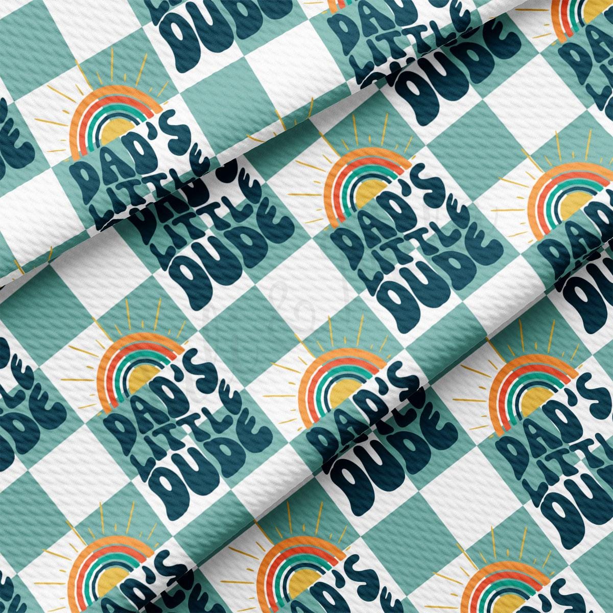 a blue and white checkered fabric with a rainbow design