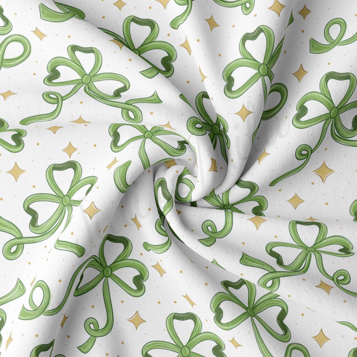 a close up of a green and white fabric