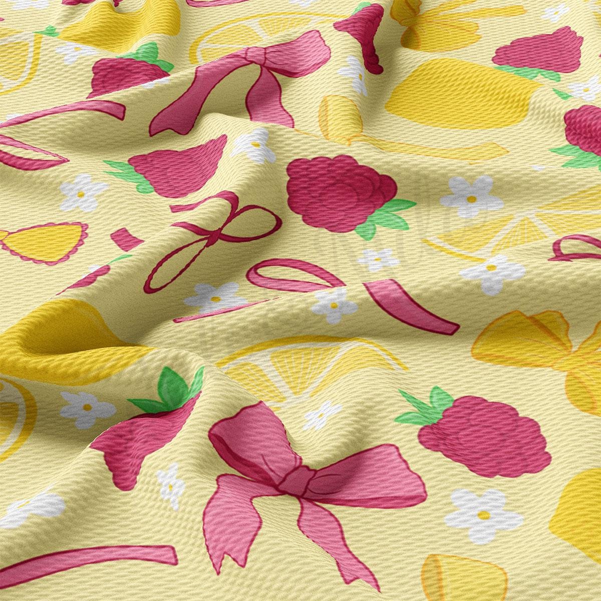 a close up of a yellow and pink flowered fabric
