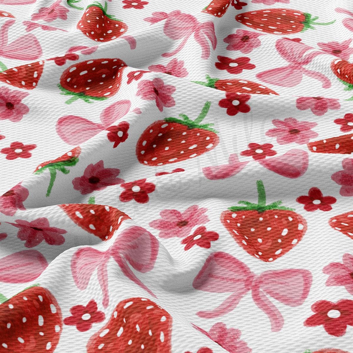 a close up of a strawberry print fabric