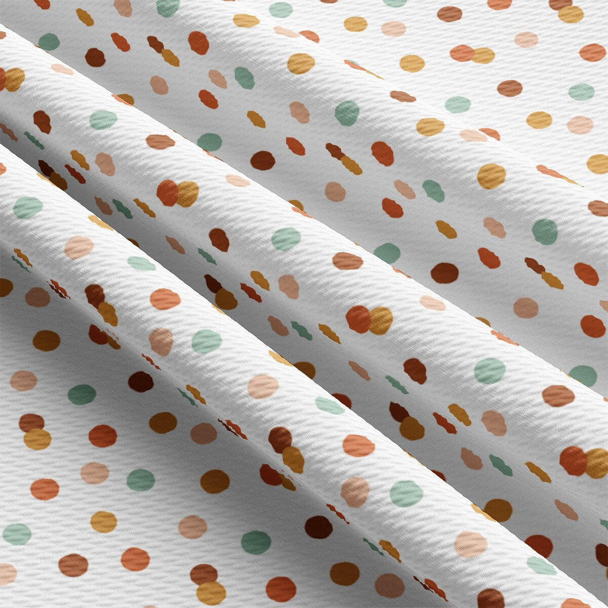 a white background with multicolored polka dots