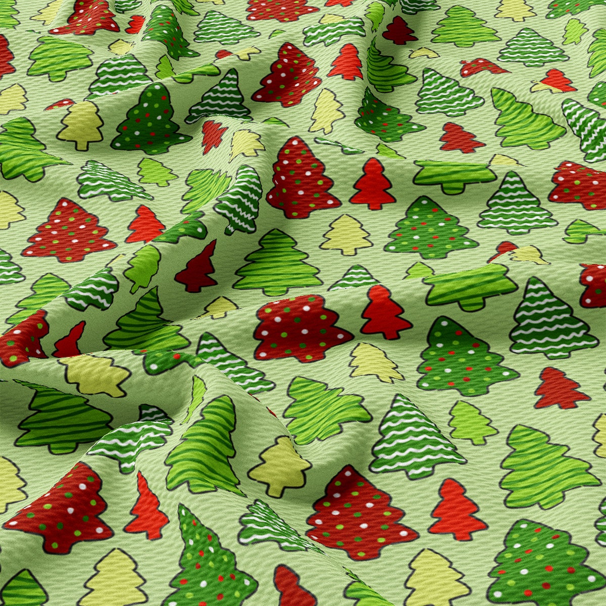 a green and red christmas tree pattern on a white background