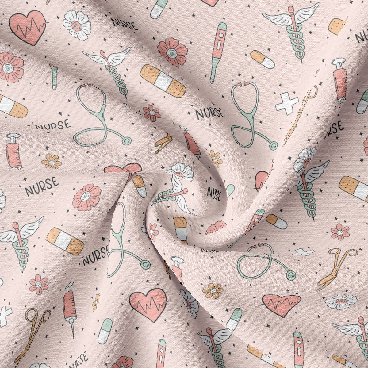 a close up of a pink fabric with medical symbols on it