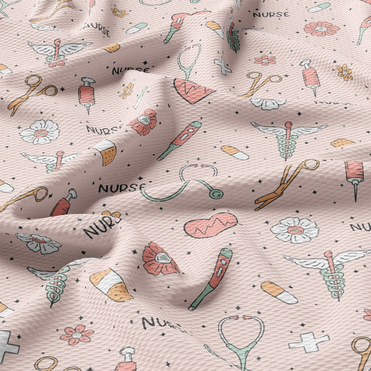 a close up of a pink fabric with medical symbols on it