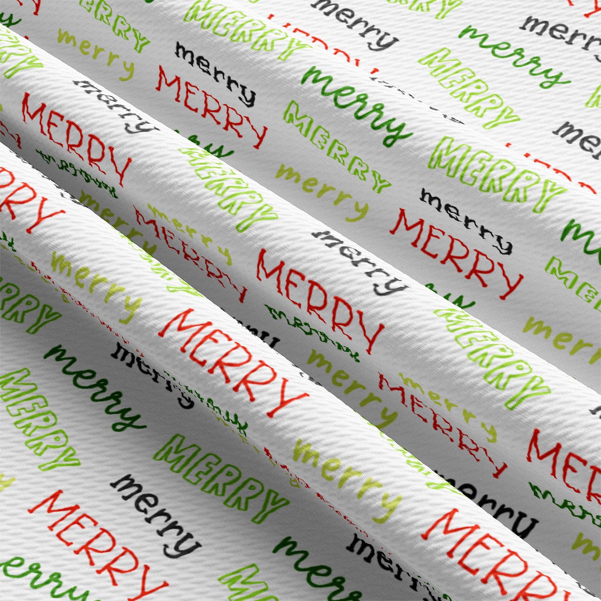 merry merry wrapping paper on top of each other