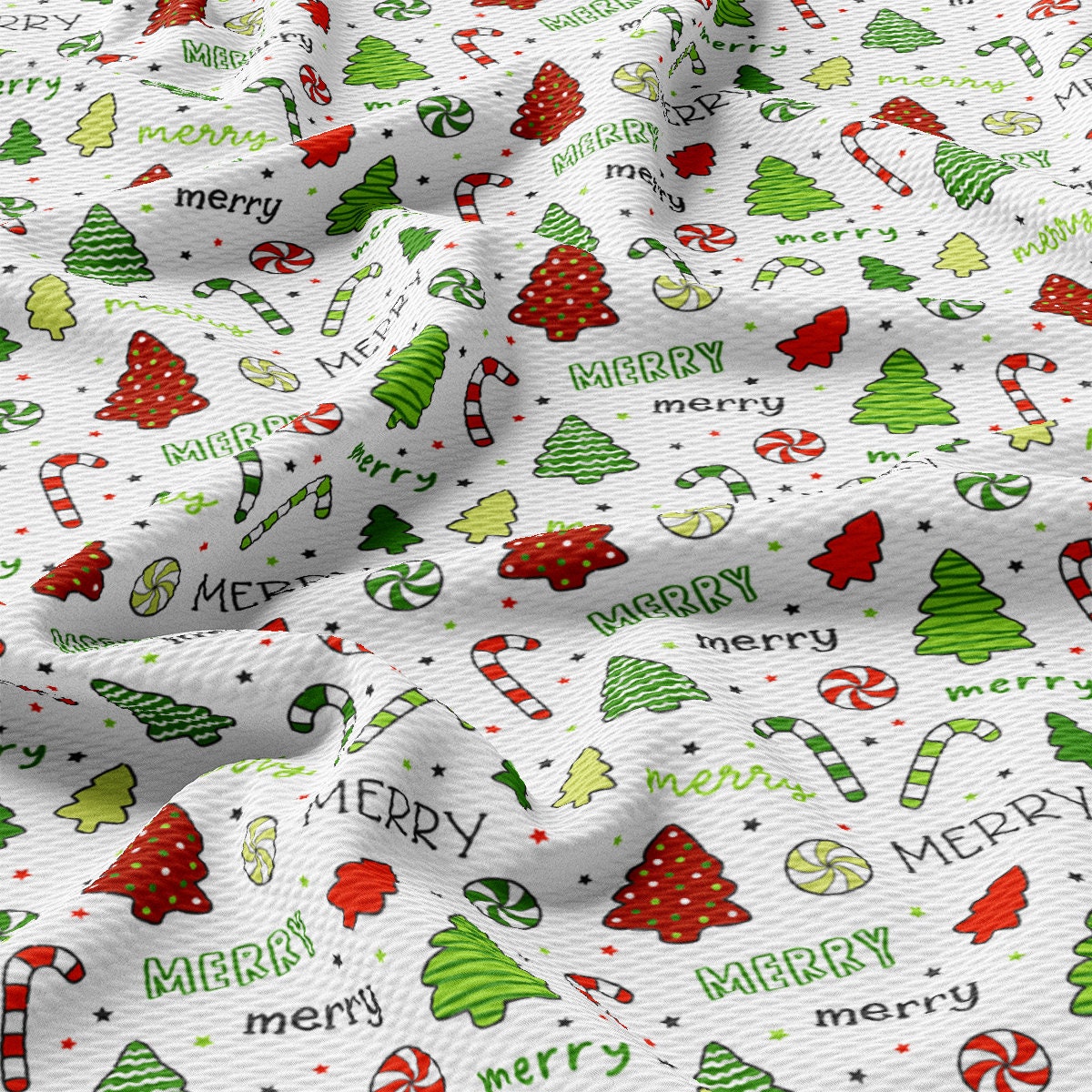 a white fabric with christmas trees and candy canes