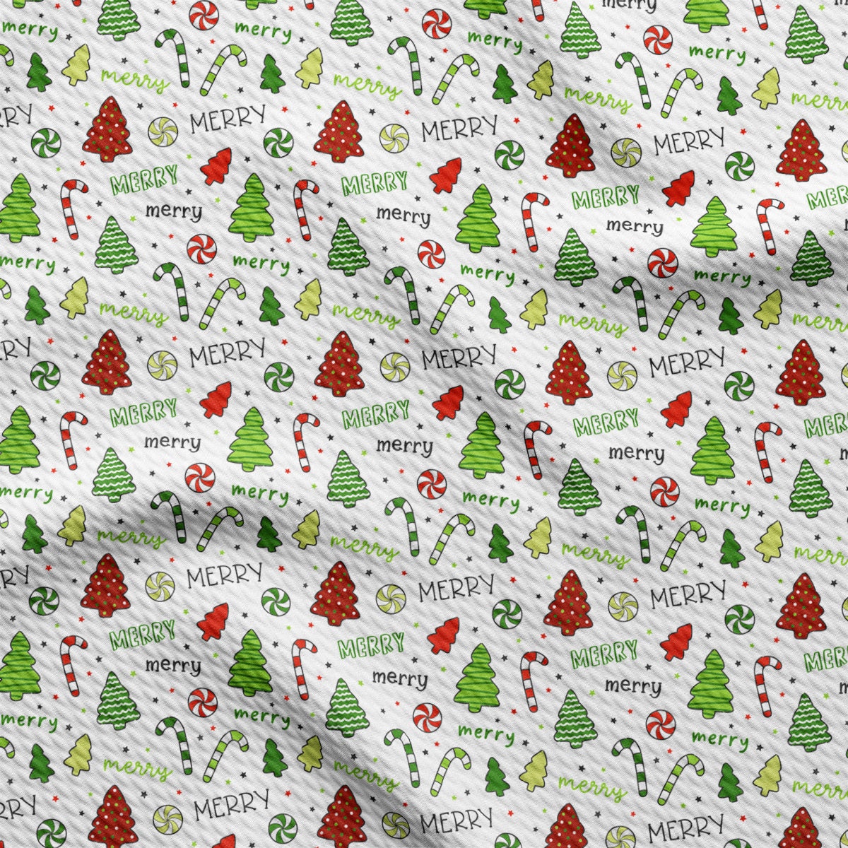 a white christmas wrapping paper with trees and candy canes