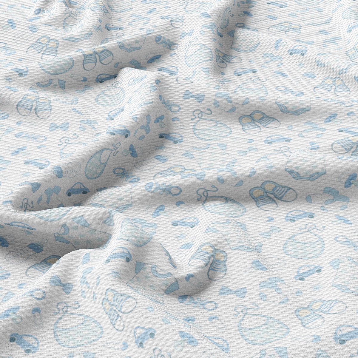 a close up of a blue and white pattern on a sheet