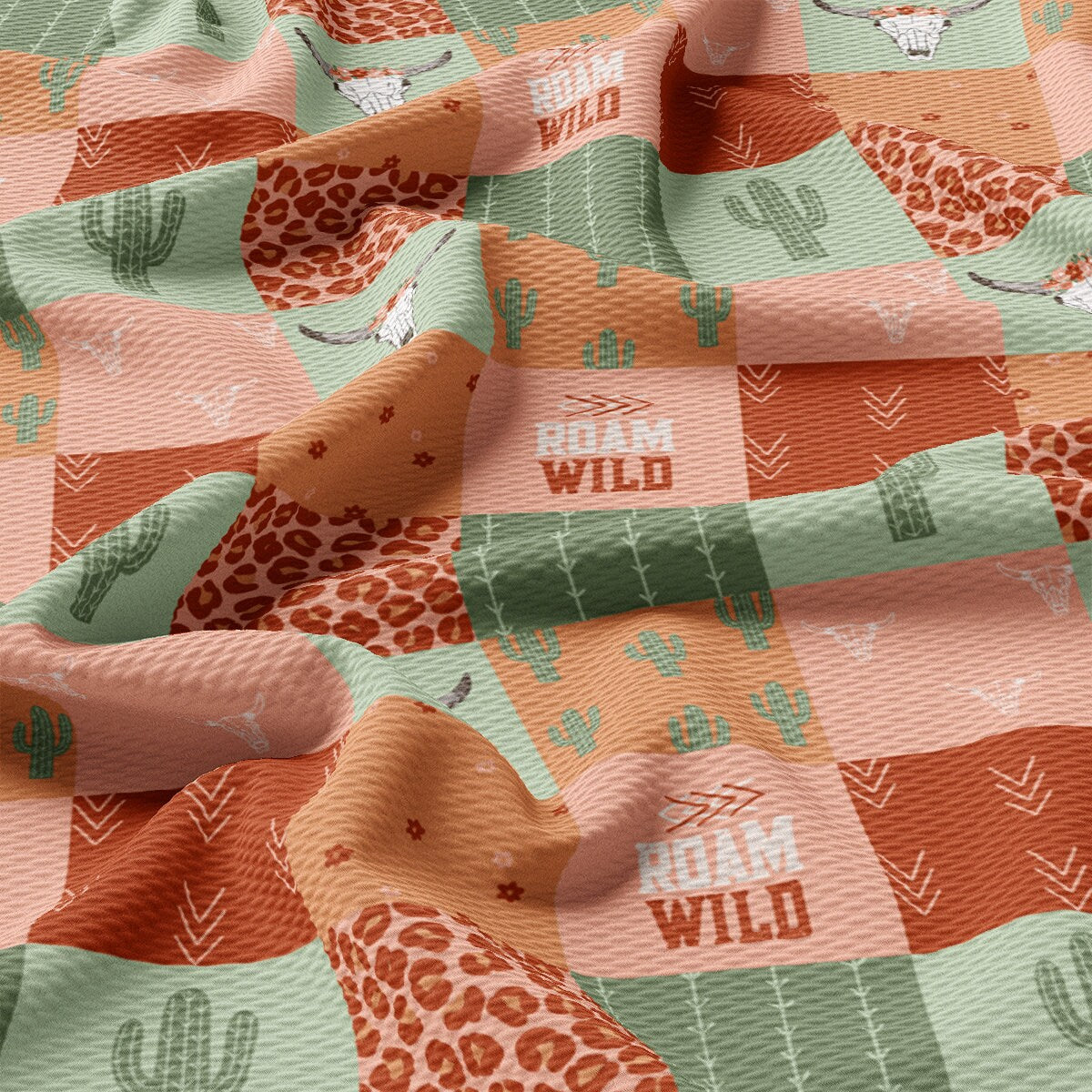 a close up of a fabric with a giraffe pattern