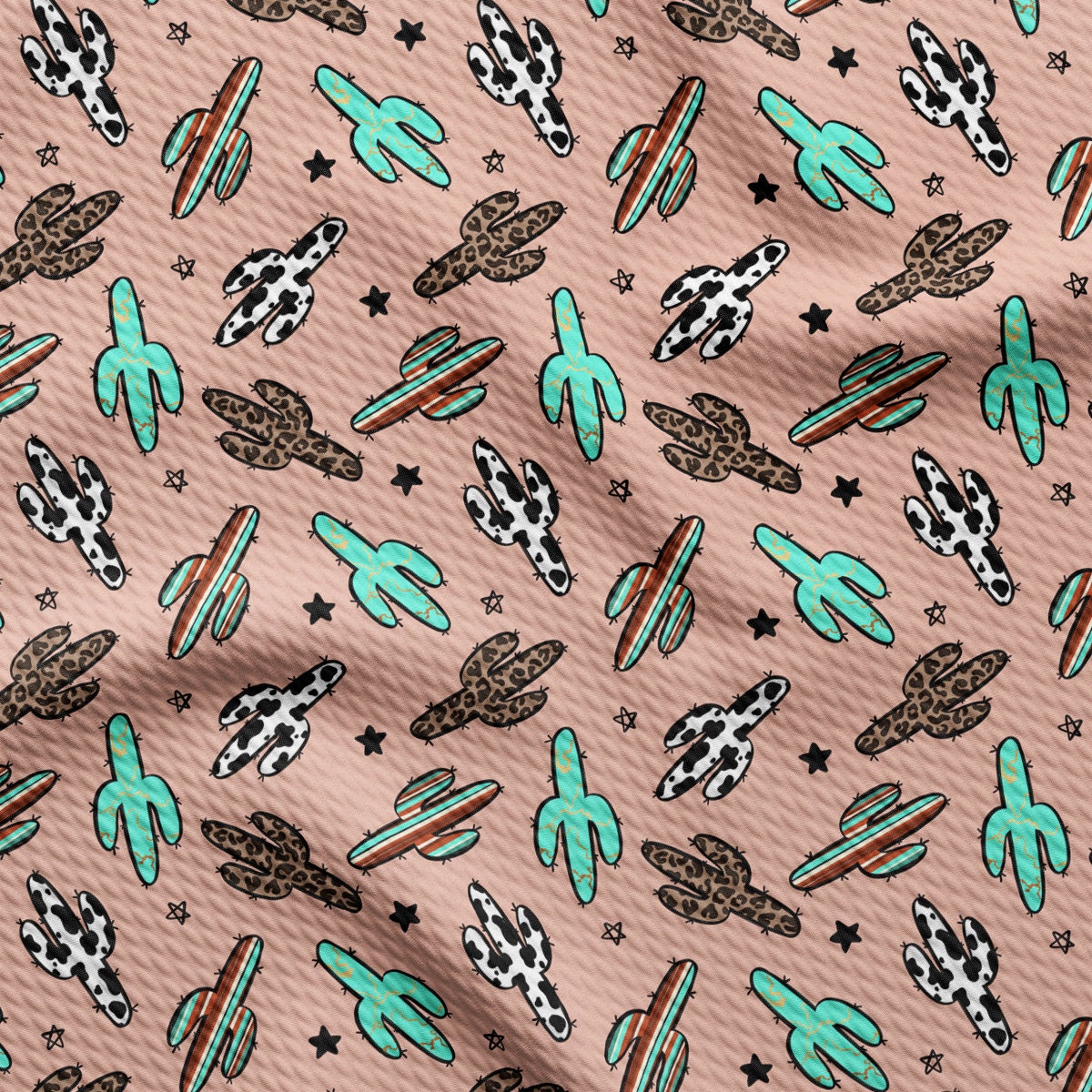 a pink background with a pattern of cactus and stars