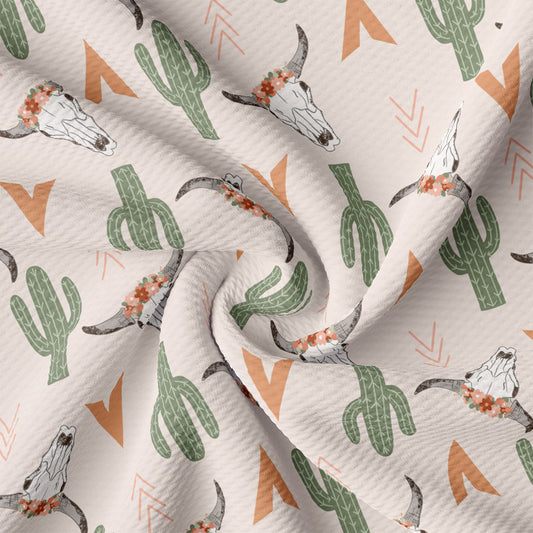 a white fabric with a cactus pattern on it